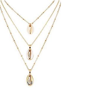 Stacked gold shell necklace 🐚